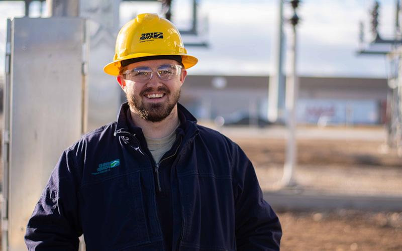 Stations technician smiling at the camera